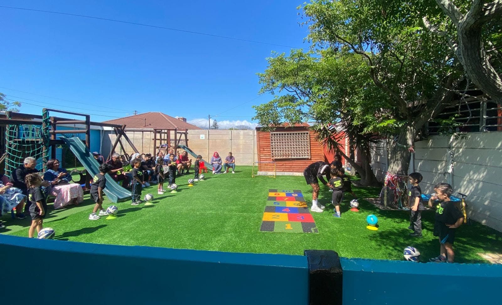 Children playing in the Wonderland Kids' Academy play-yard